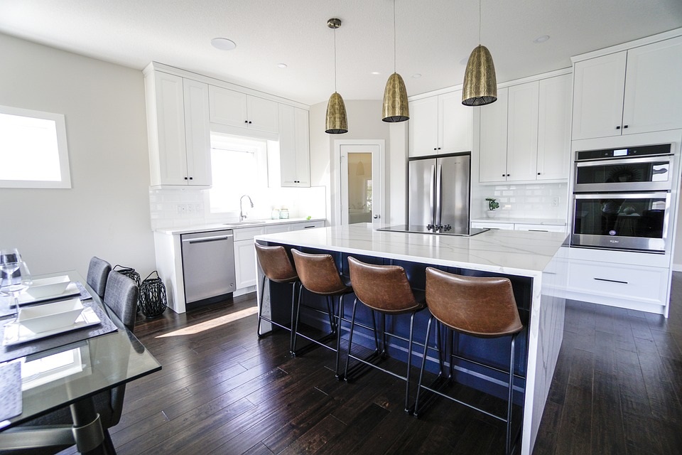 Stylish Navy Kitchen Island with White Cabinets